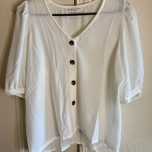 Women’s white button-up shirt. Never worn. Size L.